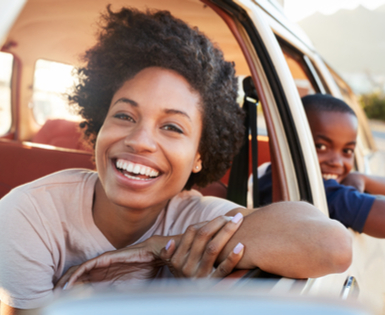 Happy woman using Union Plus Auto Insurance Happy woman using Union Plus Auto Insurance