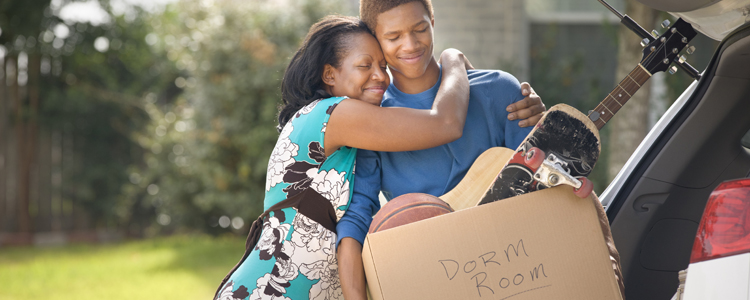 Happy mom sending her son off to college Happy mom sending her son off to college